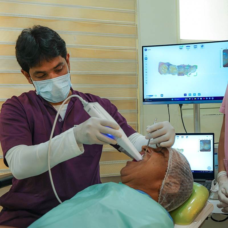 Dentist reassuring a patient at Laasya Dental in Visakhapatnam